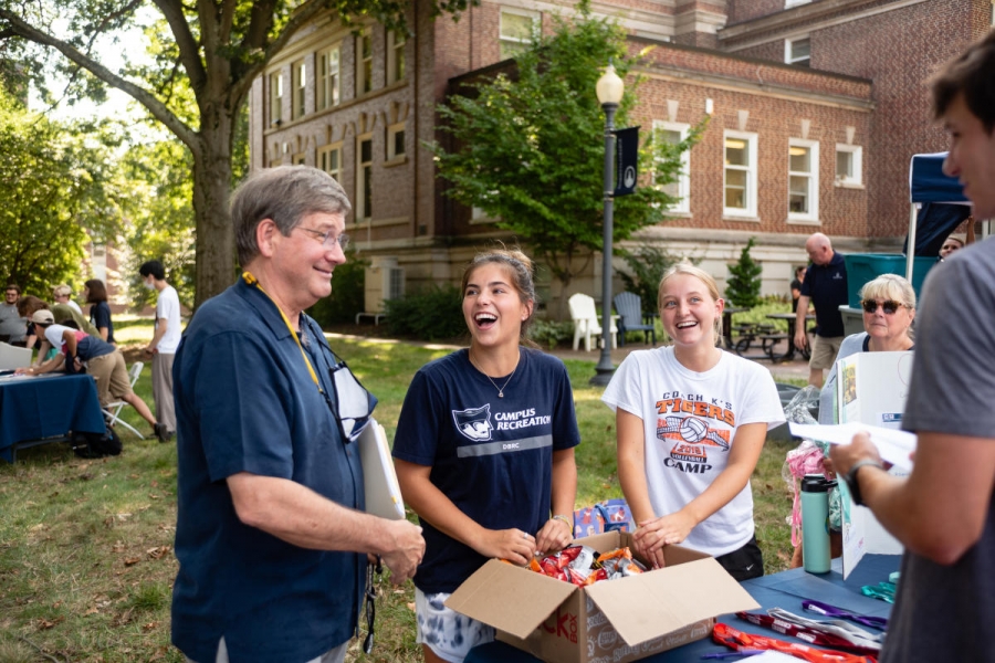 President Ruud speaks with students on the Christy Mall